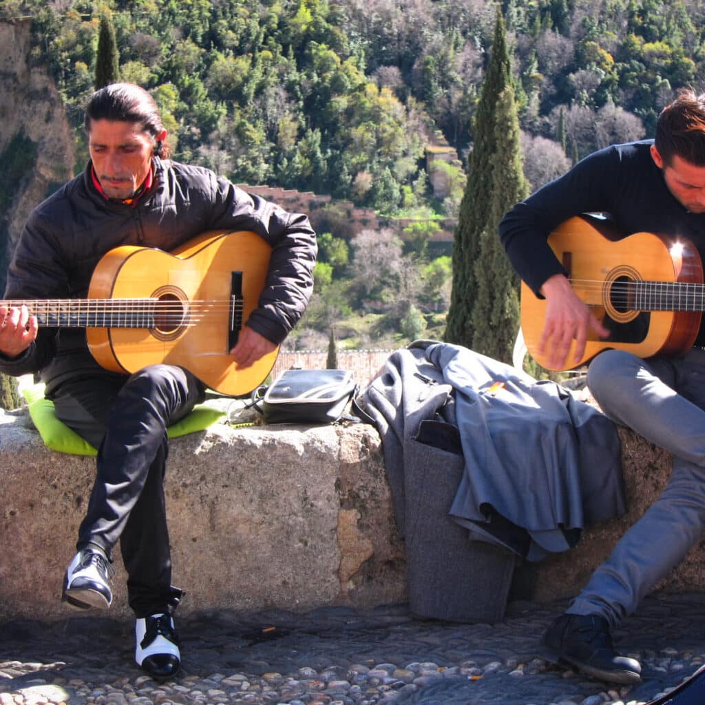 Guitar players in Granada
